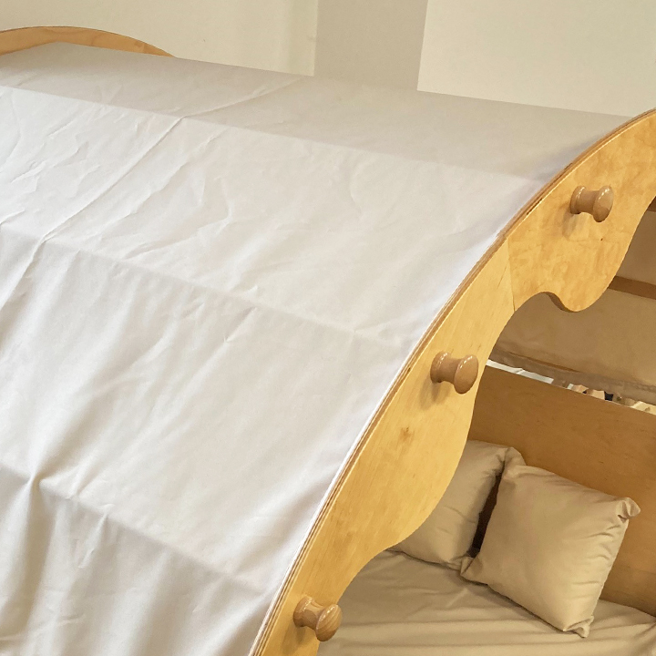 Close up of stone coloured canopy fabric