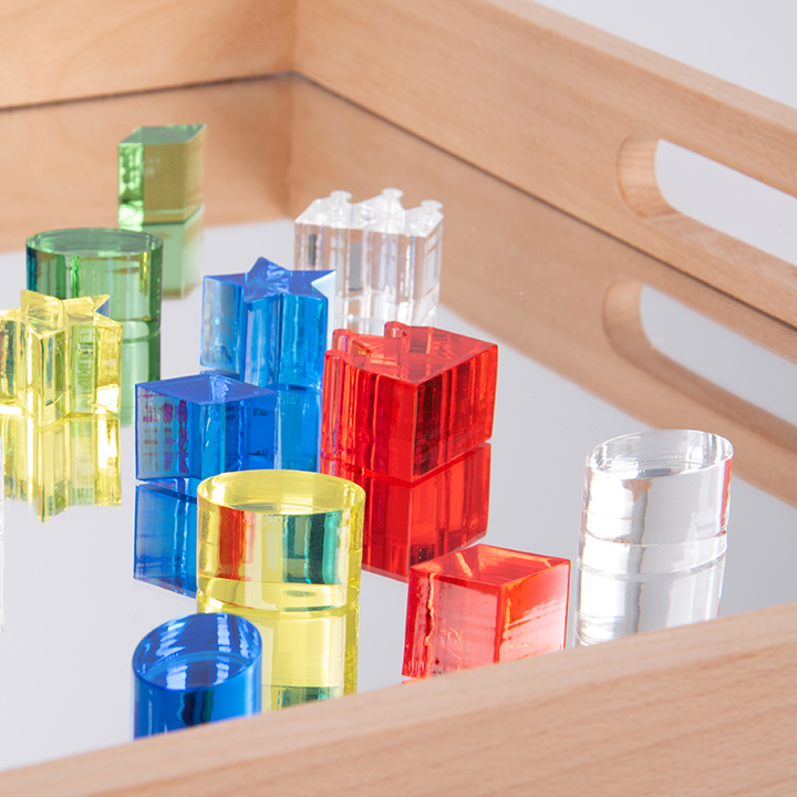 Coloured shapes on Wooden tray with acrylic mirrored base