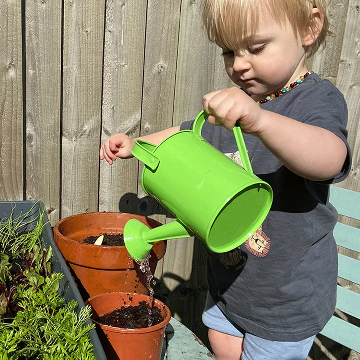 Miniature metal watering can
