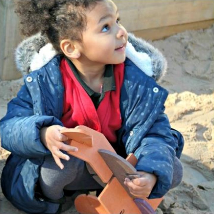 Child with interlocking shapes