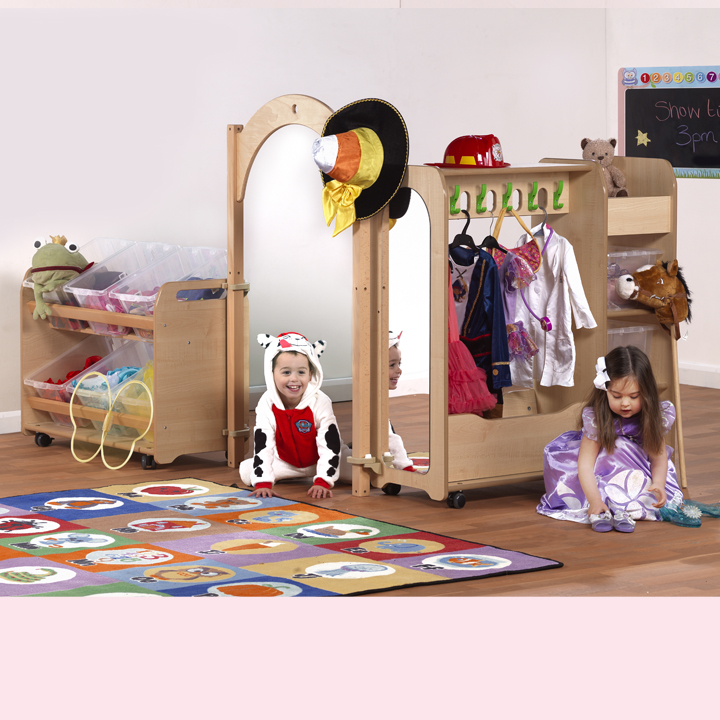 Children having fun with dress up zone