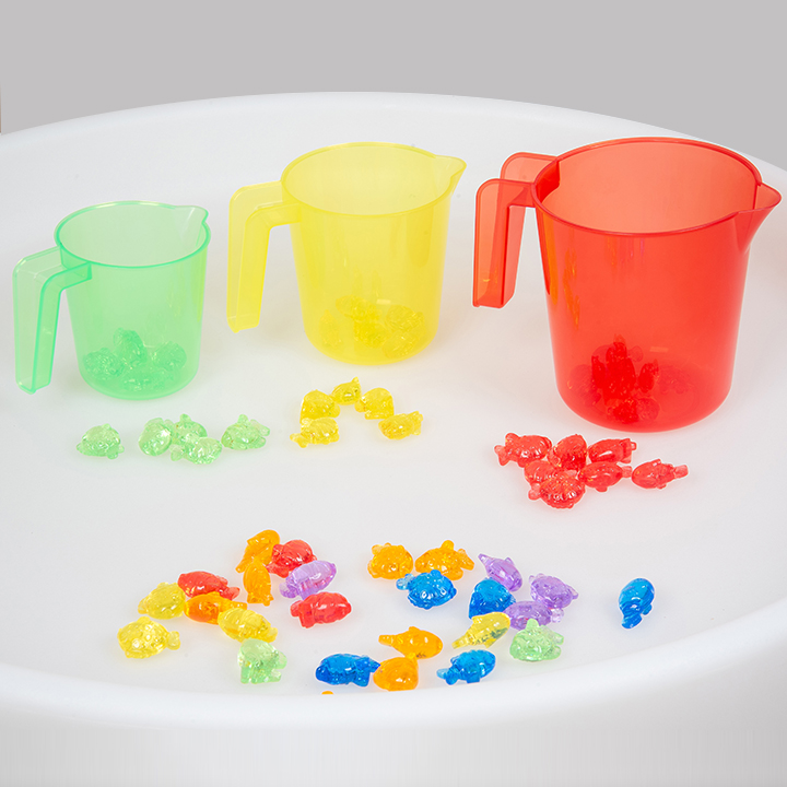Red, yellow and green plastic jugs