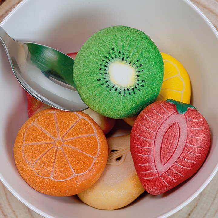 Set of eight colourful tactile play fruits