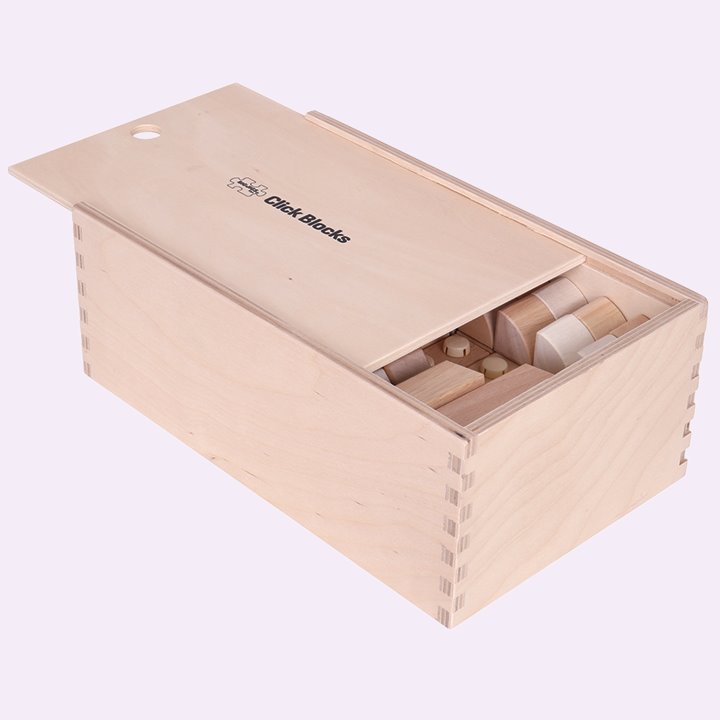 Click blocks stored away in box with sliding lid