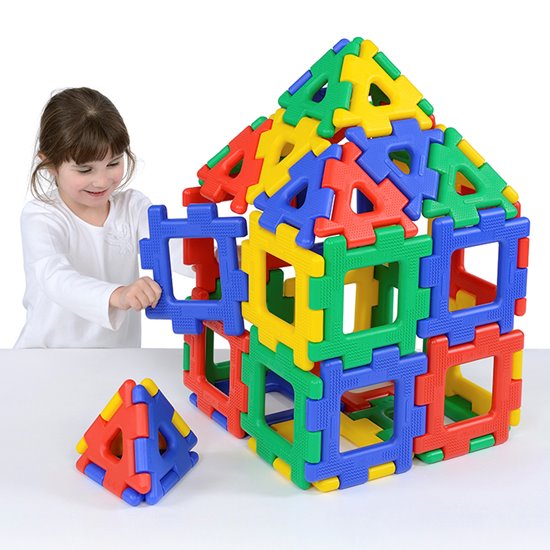 Giant house structure made from colourful polydron pieces
