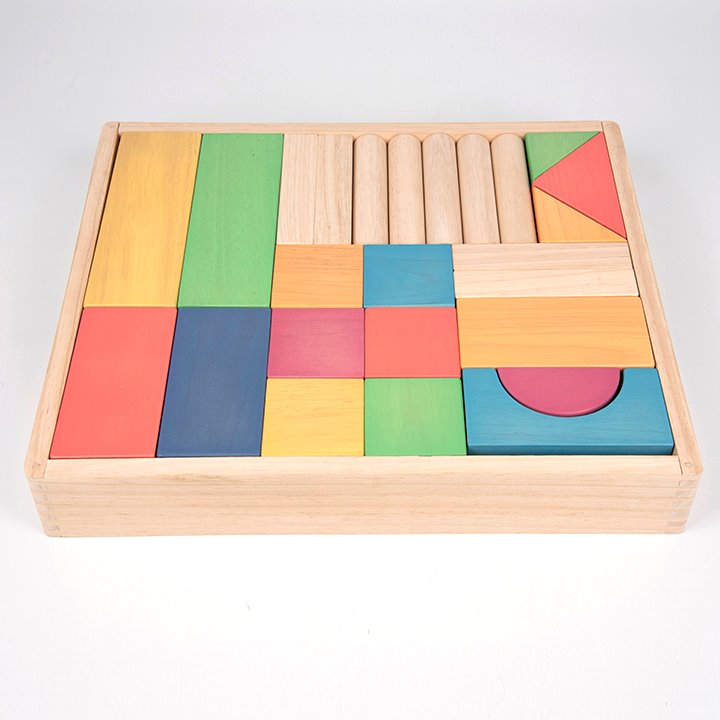 Box full of Large selection of solid rubberwood blocks - a mix of natural and rainbow coloured stain