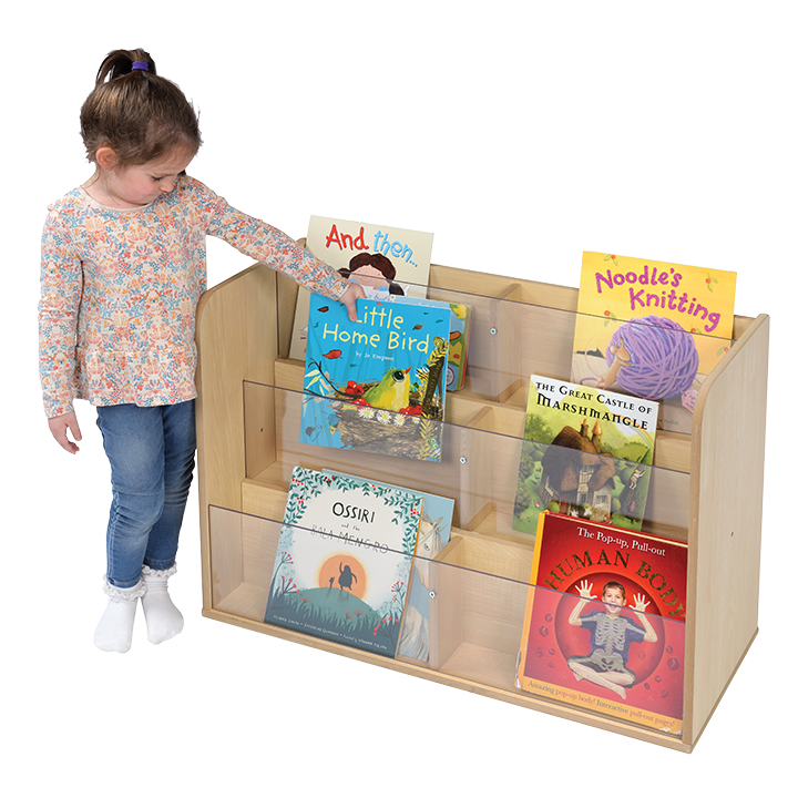 Little girl choosing from natural coloured unit