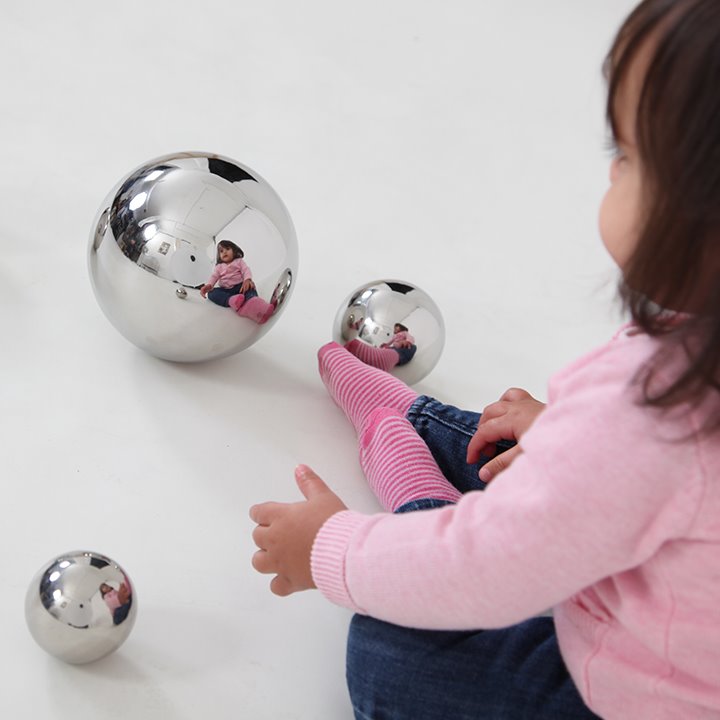 Baby with selection in silver ball