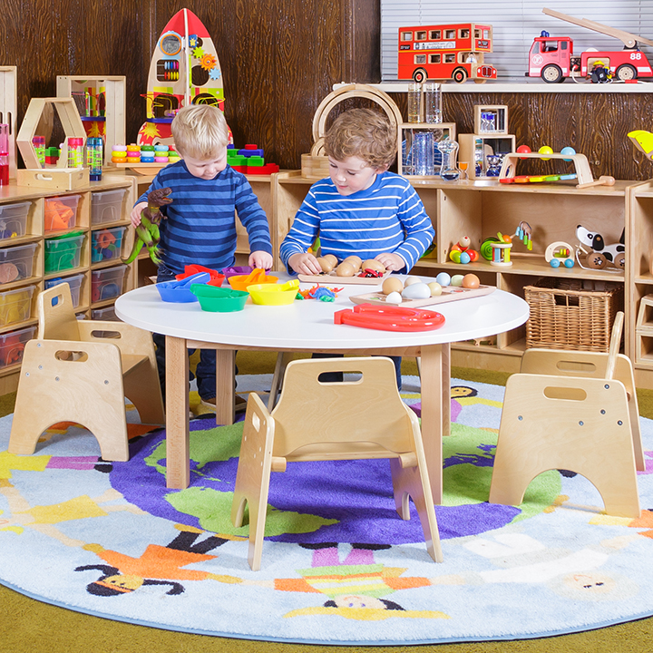 Children playing Solid wood legs and hardwearing laminate top