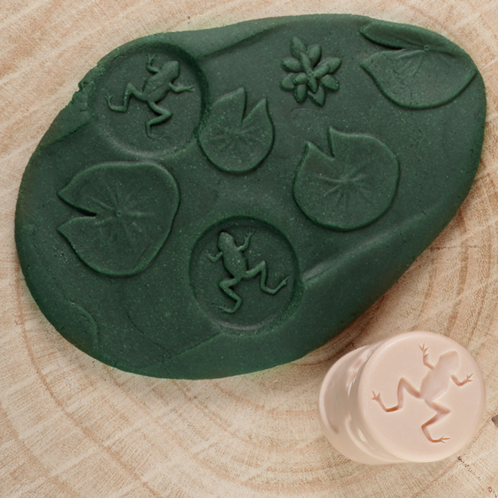 Roller makes marks in play dough