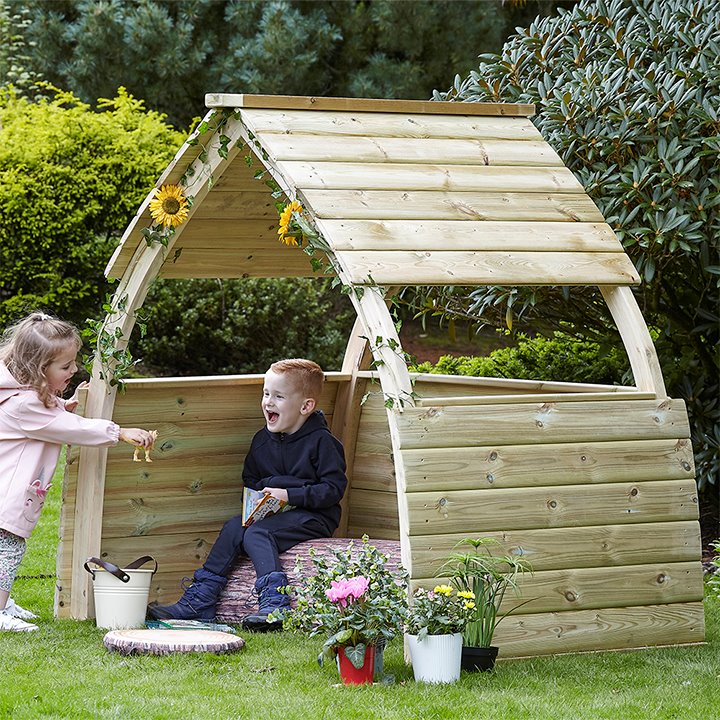 Arched play shelter wooden in garden outdoors
