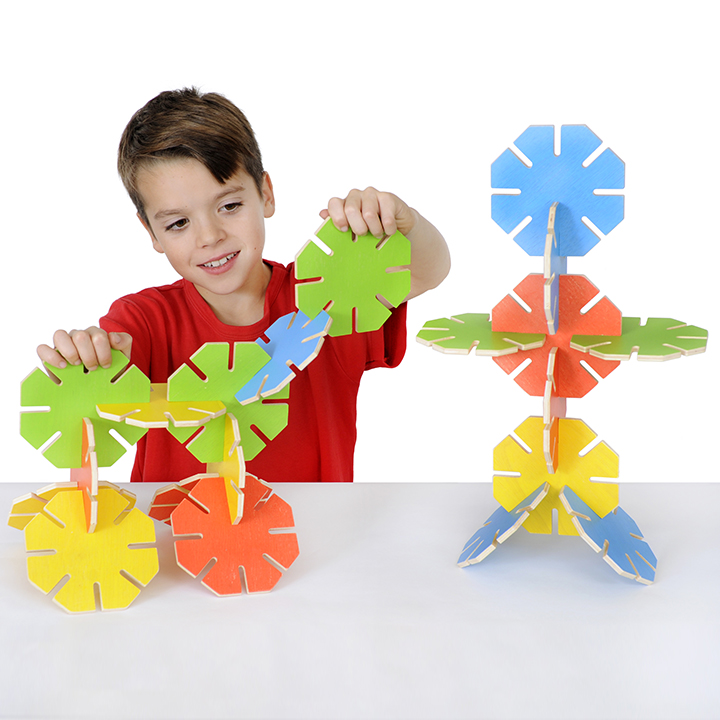 Child with Chunky wooden pieces designed for small hands