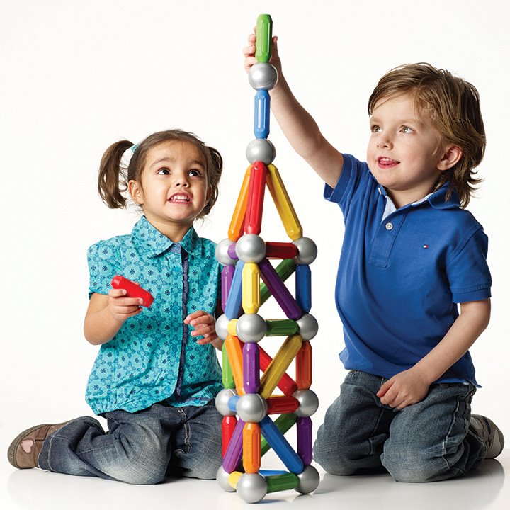Two children making Smartmax tower