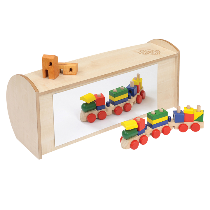 Mirrored back of shelf unit and toy train reflection