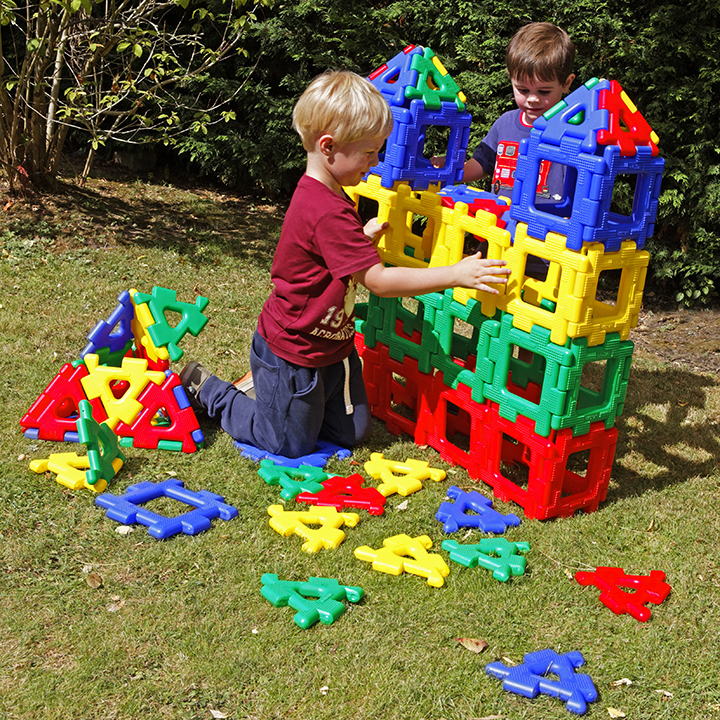Giant castle made from coloured polydron pieces