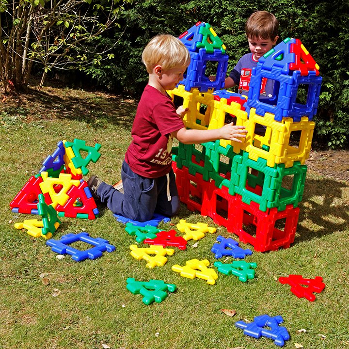 Giant castle made from coloured polydron pieces