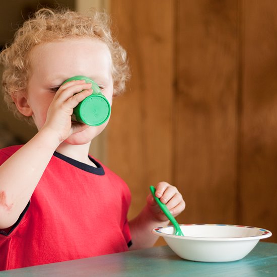 Child drinking from cup