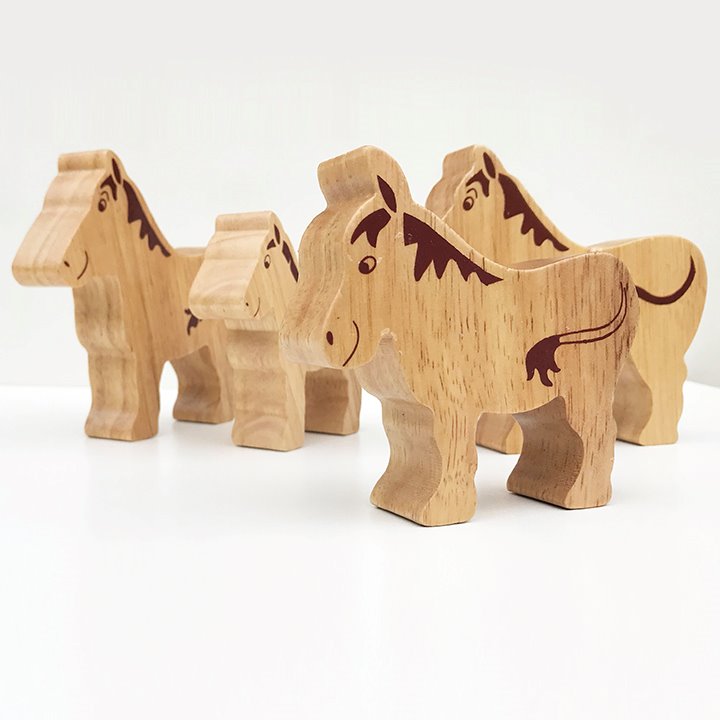 Family of wooden horses