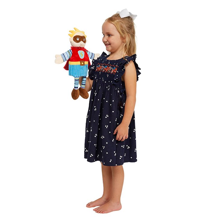 Girl holding puppet with brown mask