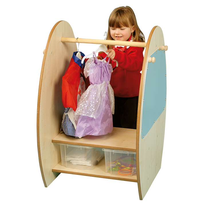 Little girl organising costumes in unit