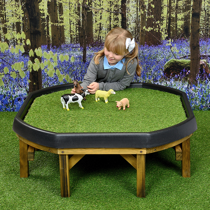 Grass Tuff Tray mat on a stand with a woodland scene