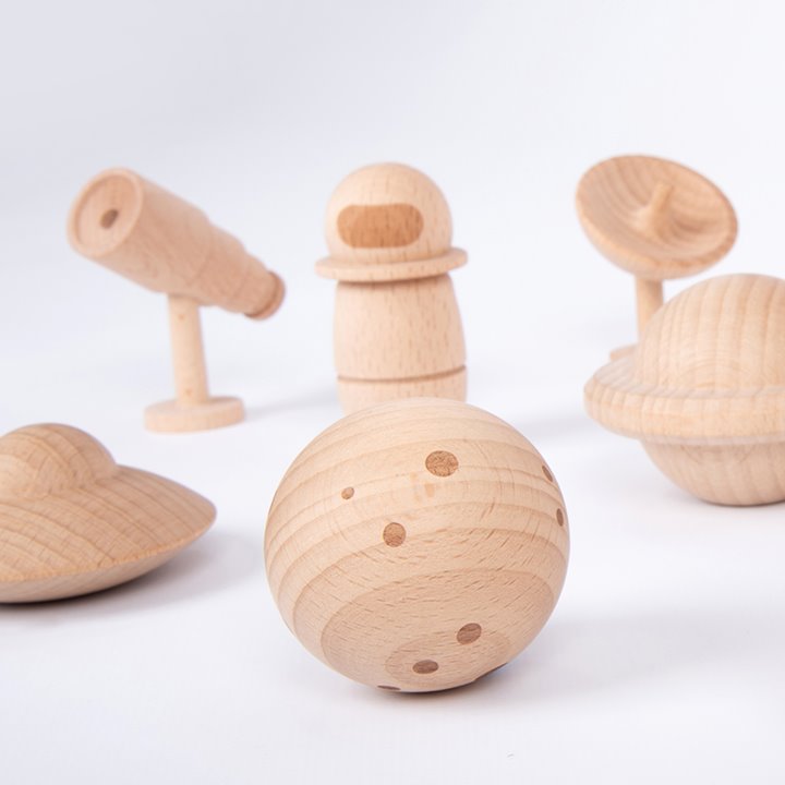 Solid beechwood characters, planets and space equipment with intricate layered details.