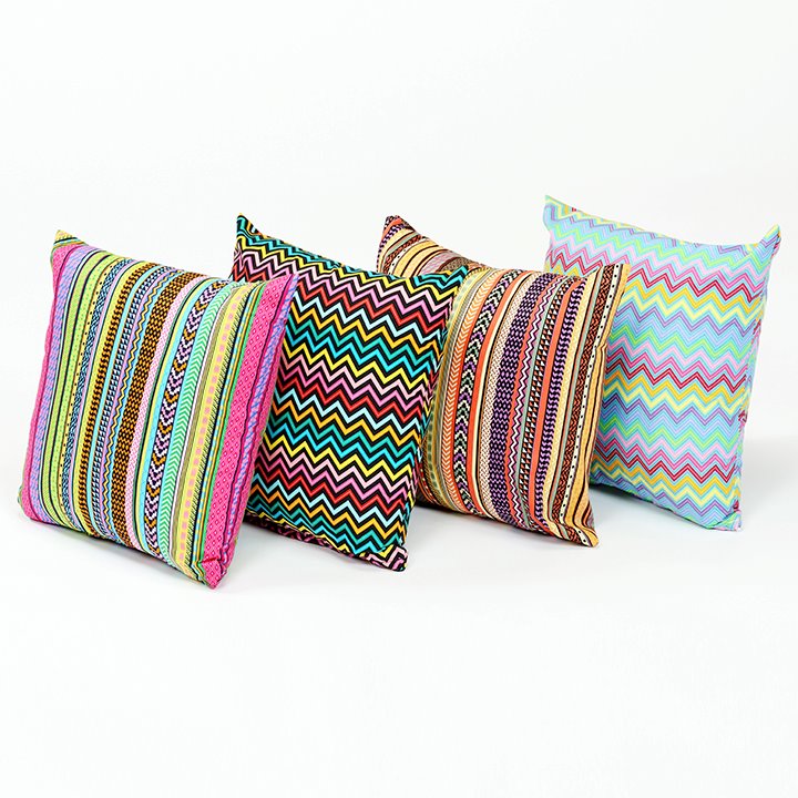 Set of 4 cushions with jazzy washable patterns