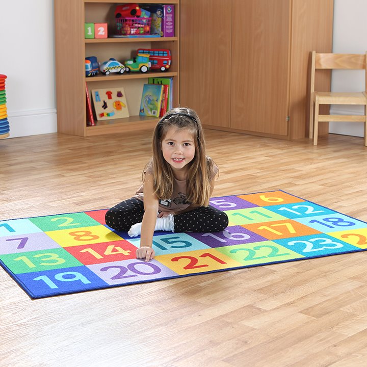 Child enjoying 1 to 24 or 1-100 to encourage counting activities