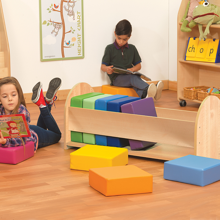 Set of 10 rainbow cushions in a storage unit