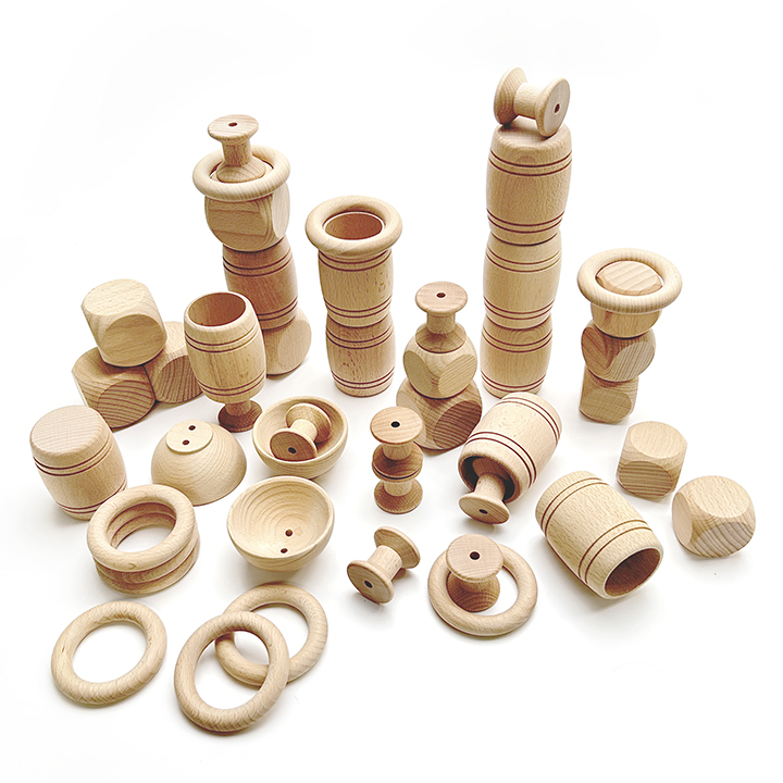 Forty five piece set of wooden loose parts
