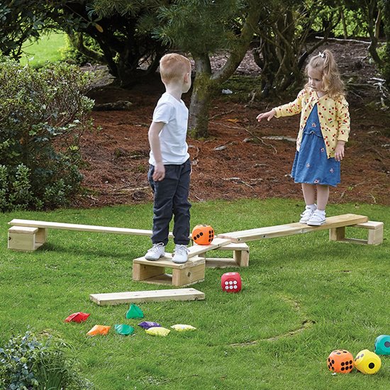 set of blocks and planks to create balance trails in garden